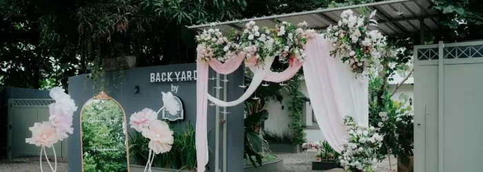 Outdoor wedding entrance decor styled by the best wedding planners in Bangalore